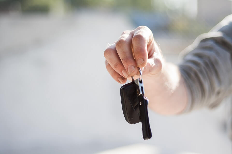 rentcarmanila's staff delivering the rental car