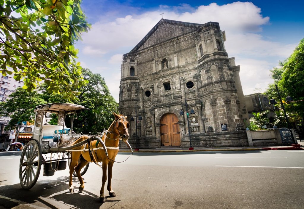 horse in front of a church